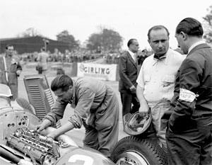 Piero Taruffi in the pits at Monza in a Tipo 158.