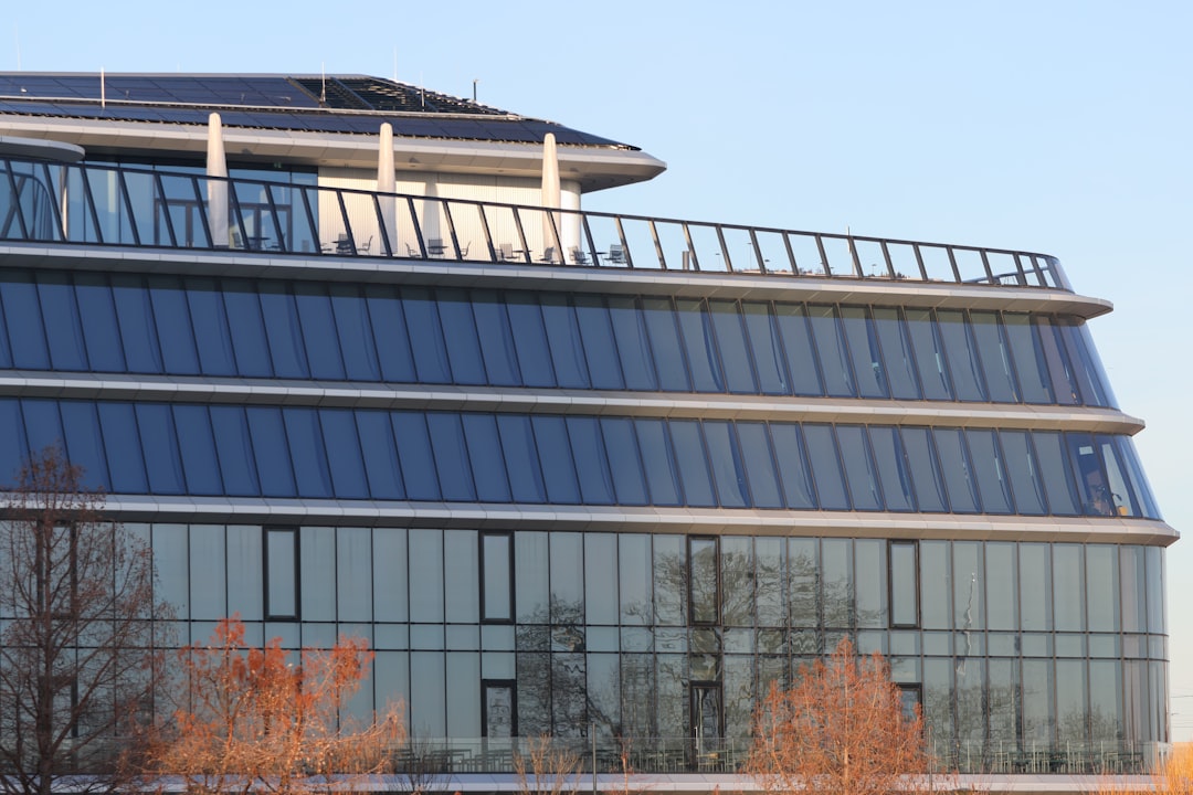 A large building with a lot of windows on top of it